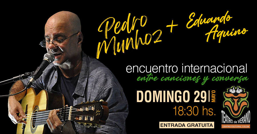 Afiche de Pedro Munhoz y Eduardo Aquino en el Teatro de Verano de Colón, con la foto en primer plano de Pedro Munhoz tocando la guitarra y cantando al micrófono con fondo negro